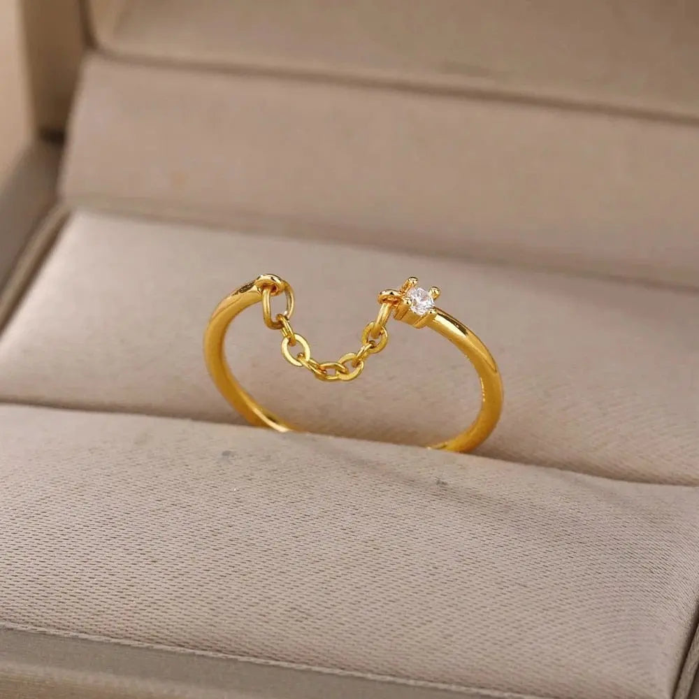 Showlu Store Nation gold stainless steel wedding ring with zircon accents, suitable for engagement or special occasions.