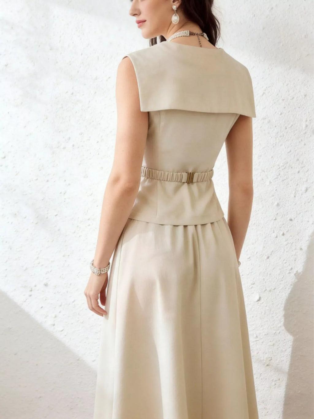 Trendsi sleeveless top and midi skirt set featuring a stylish, coordinated outfit with a fitted sleeveless top and flowy midi skirt.