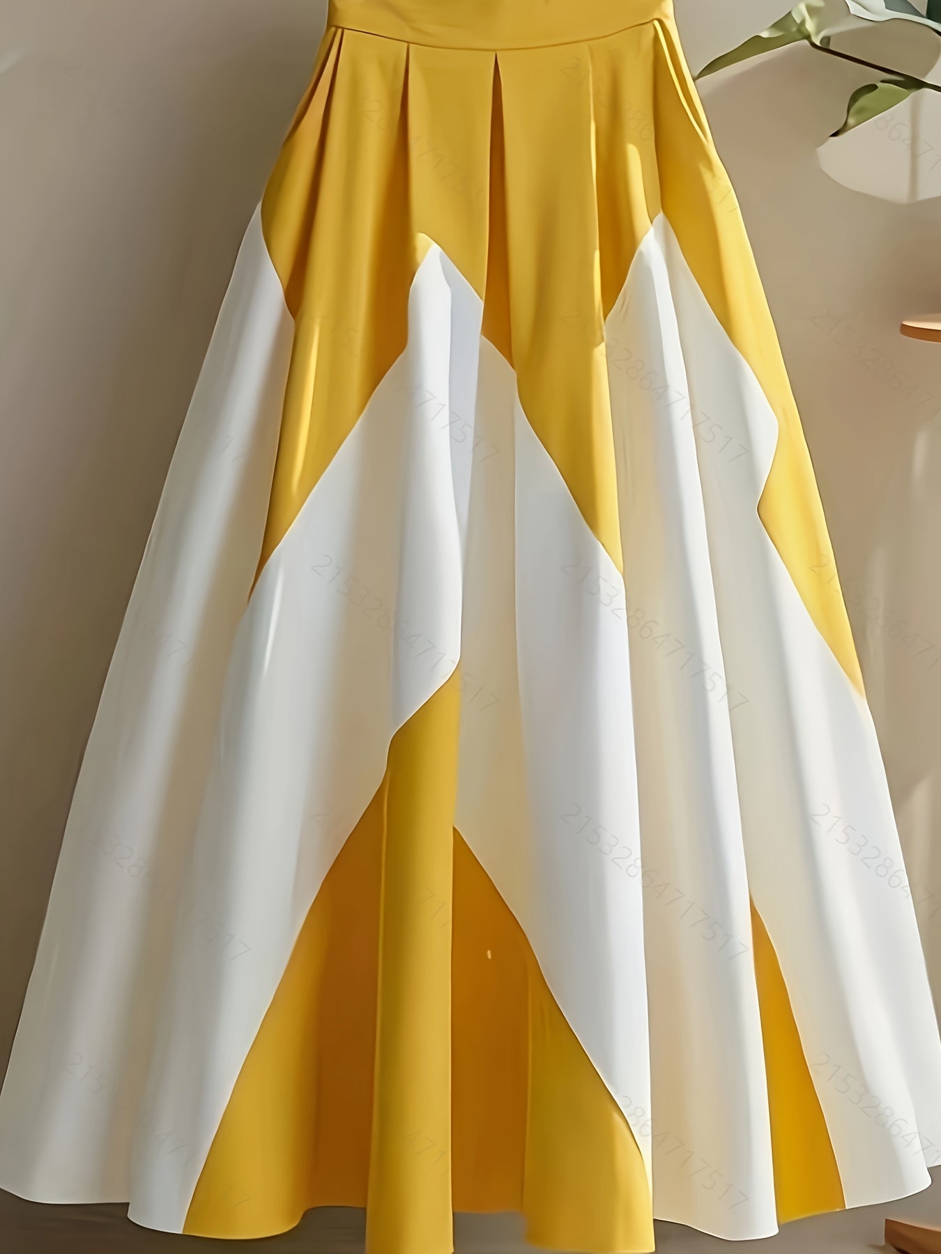 Yellow and white striped high-waist A-line skirt from SHOWLU FASHION, made of polyester, displayed on a hanger.
