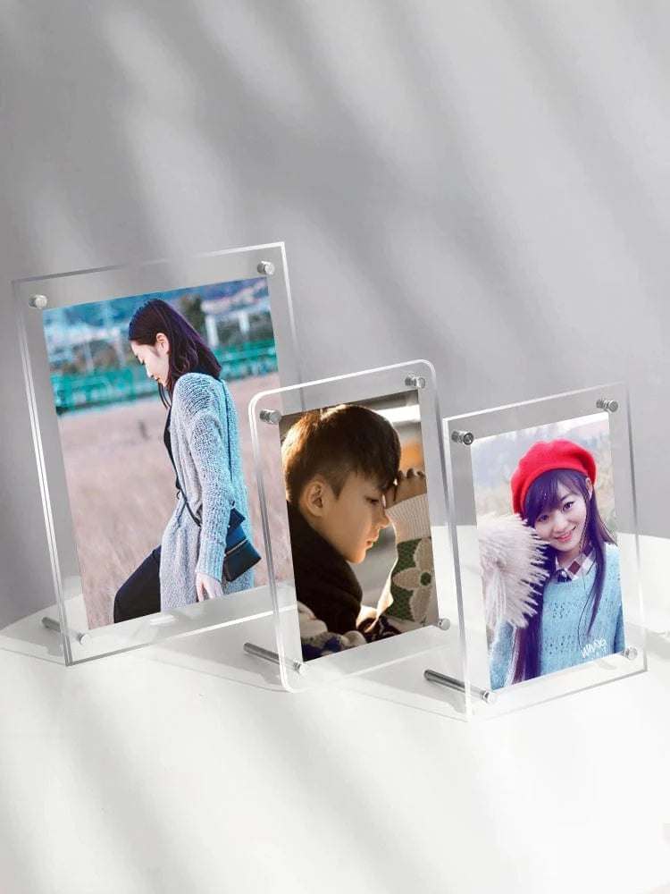 Six-inch transparent acrylic photo frame by Lin Yi, showcasing postcards and autographed photographs in a minimalist display stand.