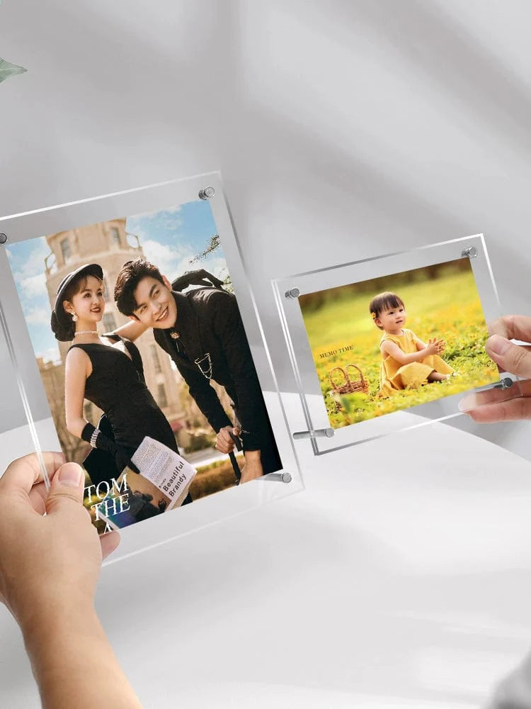 Six-inch transparent acrylic photo frame displaying postcards, minimalist stand for showcasing autographed photographs and A4-sized images.