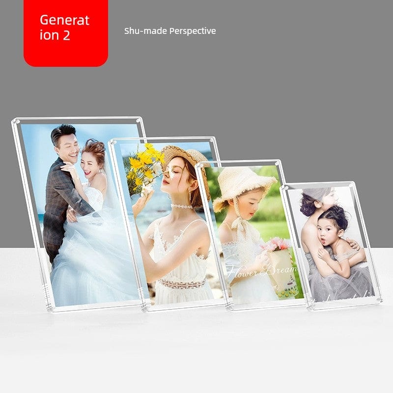 Double-sided acrylic magnetic photo frame displaying pictures, transparent and creative for showcasing photos on a table or wall.