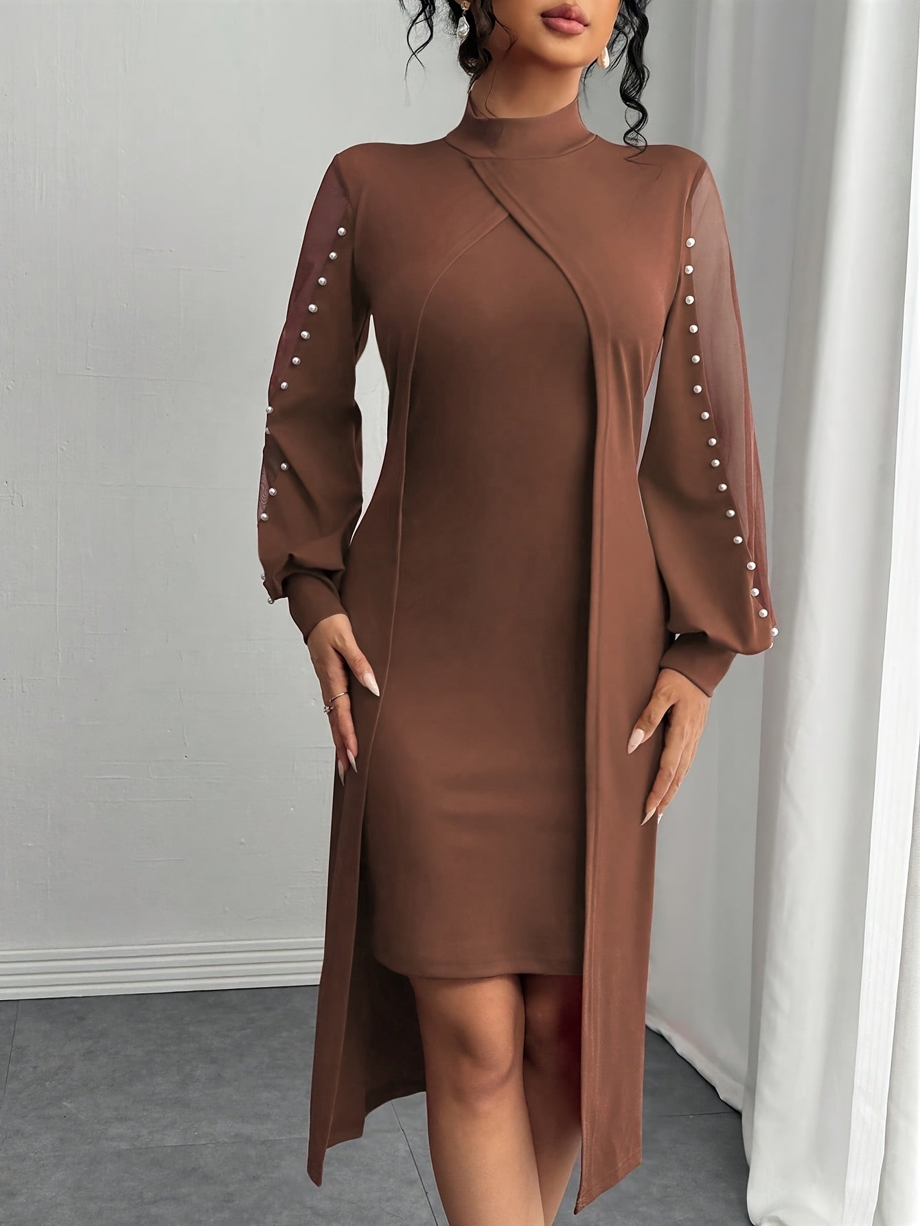 Women's black maxi dress by Showlu Fashion, elegant fitted design with crew neckline, flowing fabric, perfect for formal occasions.