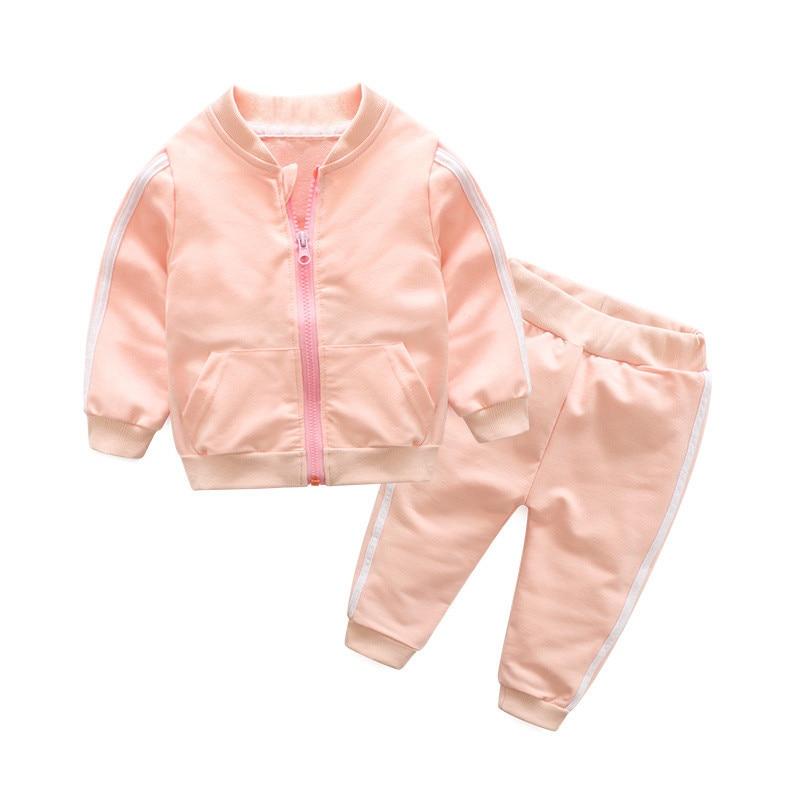 Baby boy showing SHOWLU FASHION striped cotton bomber jacket and matching pants sports set, casual and comfortable for little boys.