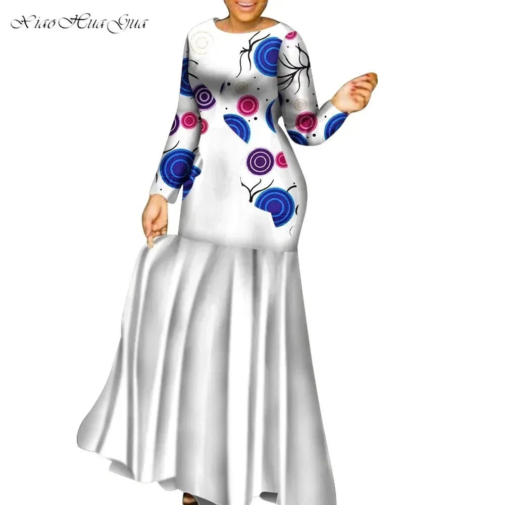 African print cotton couple outfits featuring long party maxi dresses for men and women, with vibrant traditional patterns.
