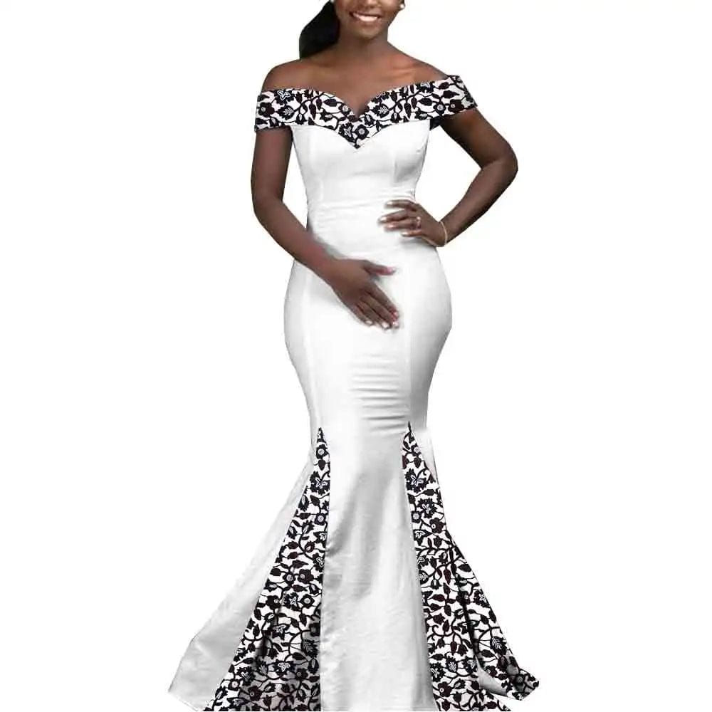 African couple matching outfits from SHOWLU FASHION STORE: women's mermaid dress and men's 3-piece set with hat for wedding or special occasion.