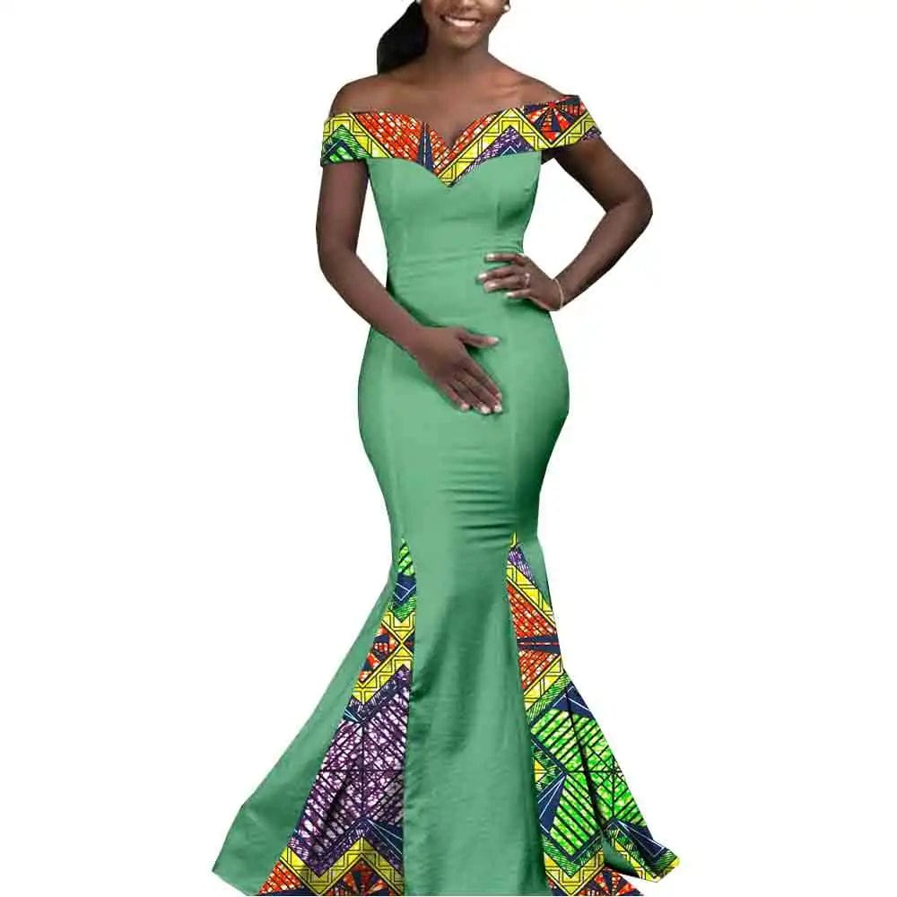African couple matching outfits featuring a women's mermaid dress and men's three-piece suit, stylish wedding attire from SHOWLU FASHION STORE.