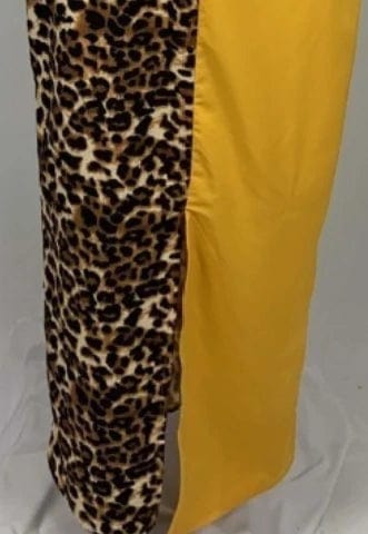 African-inspired Showlu Fashion leopard print cotton maxi abaya dress with traditional dashiki design and Islamic modest style.
