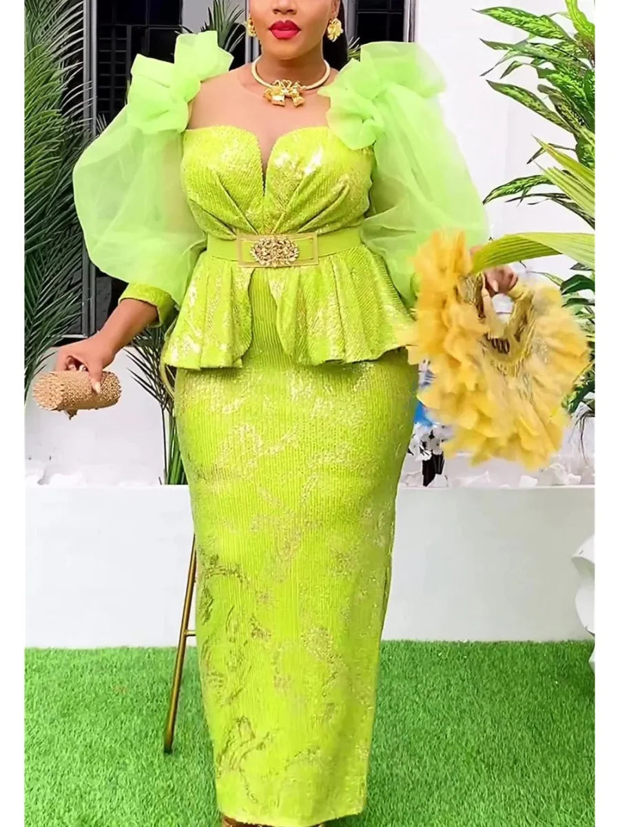 Plus size African sequin evening dress by SHOWLU FASHION, dashiki style with colorful Ankara patterns and long flowing design.