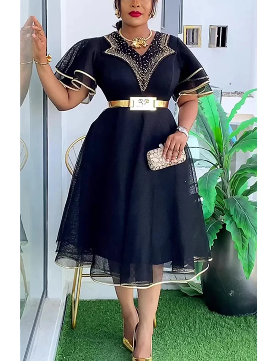 Elegant African Dashiki Ankara gown by SHOWLU FASHION STORE, plus-size Muslim wedding dress with vibrant patterns and long flowing design.