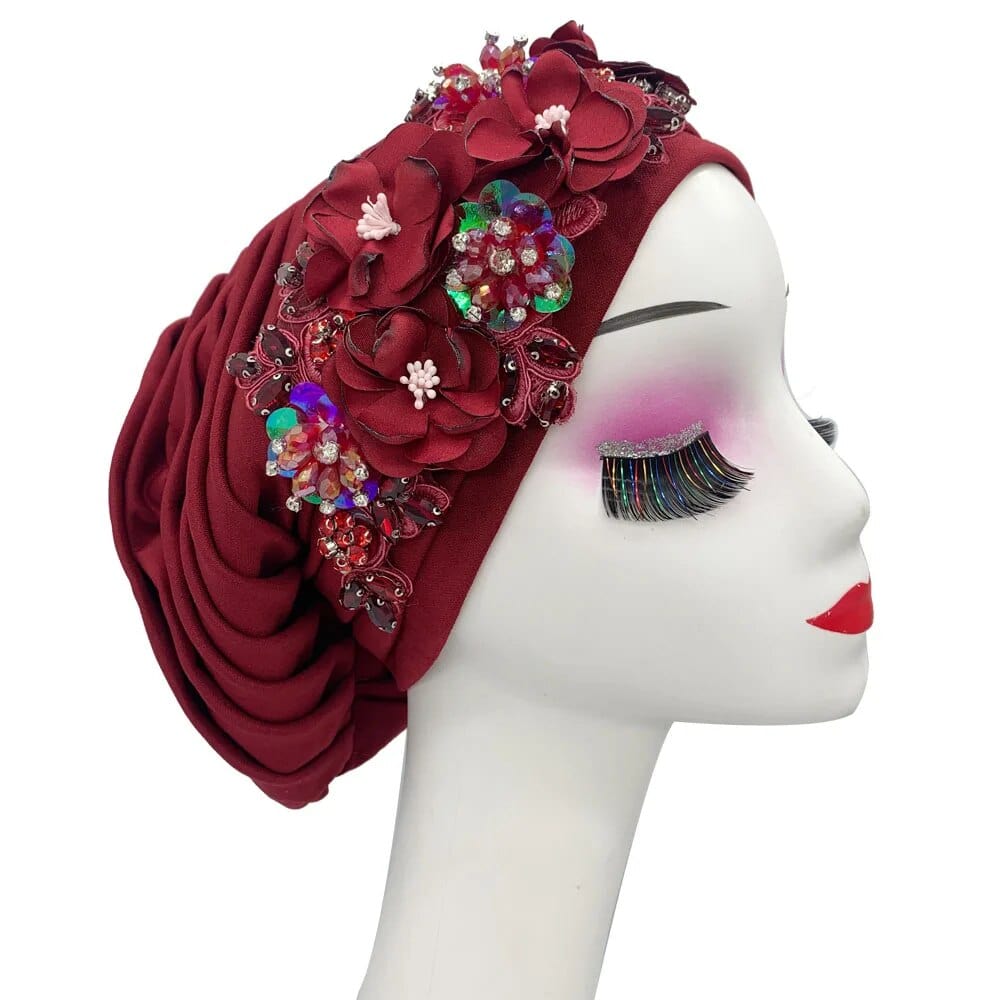 Elegant women's turban cap with floral and diamond embellishments, stylish hijab headwear for Muslim women.