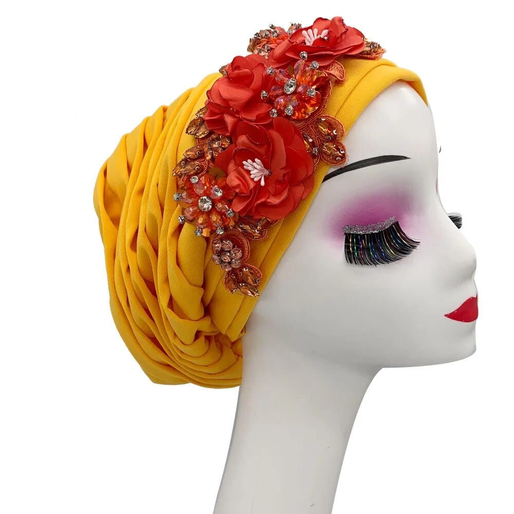 Elegant women's turban cap with floral and diamond accents, stylish hijab headwear for Muslim women and African parties.