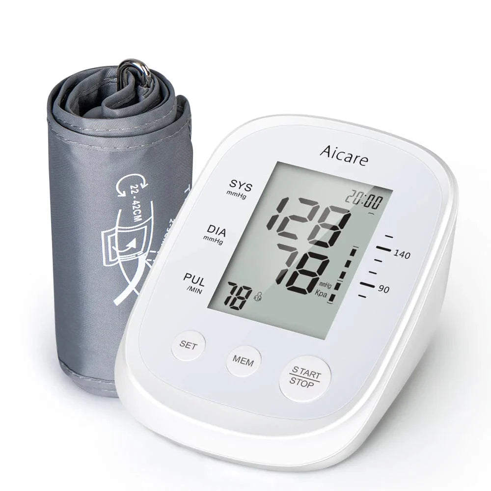 AICARE automatic digital blood pressure monitor on upper arm, showing display and cuff for accurate BP measurement.