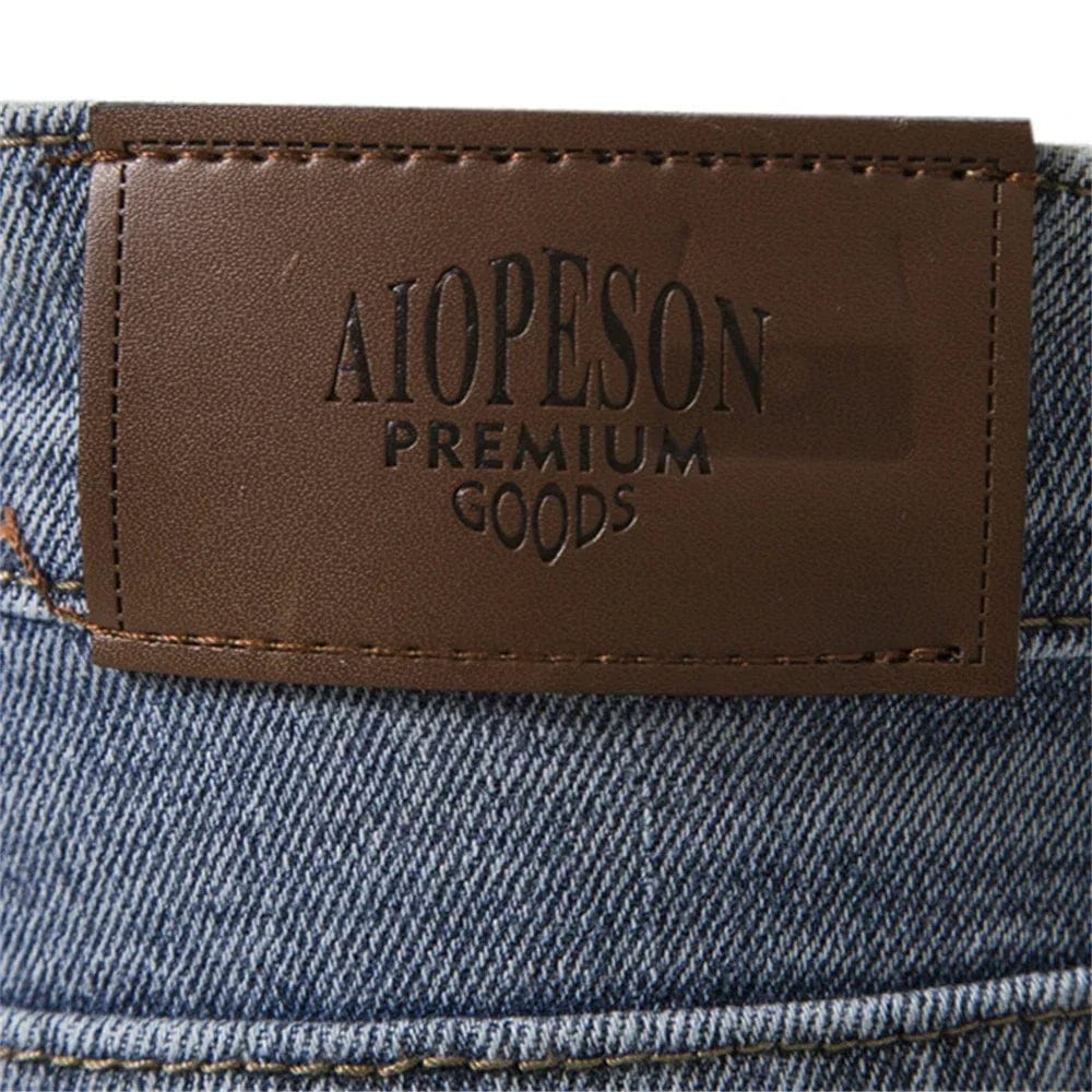 Men's slim fit straight denim jeans by AIOPESON, made of quality cotton, perfect for business casual or casual wear.