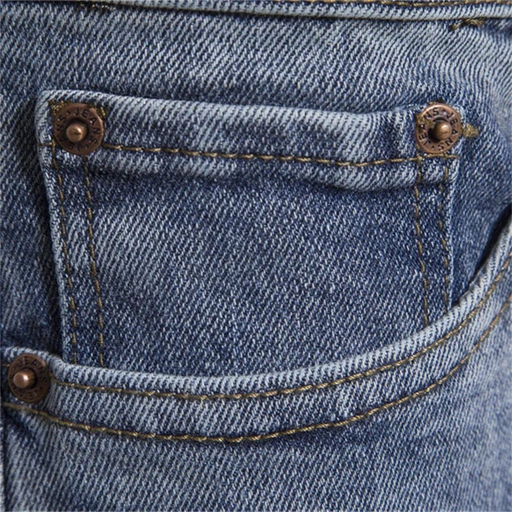 Slim fit men's denim jeans by Showlu Fashion, straight cut with cotton fabric, suitable for business casual wear.
