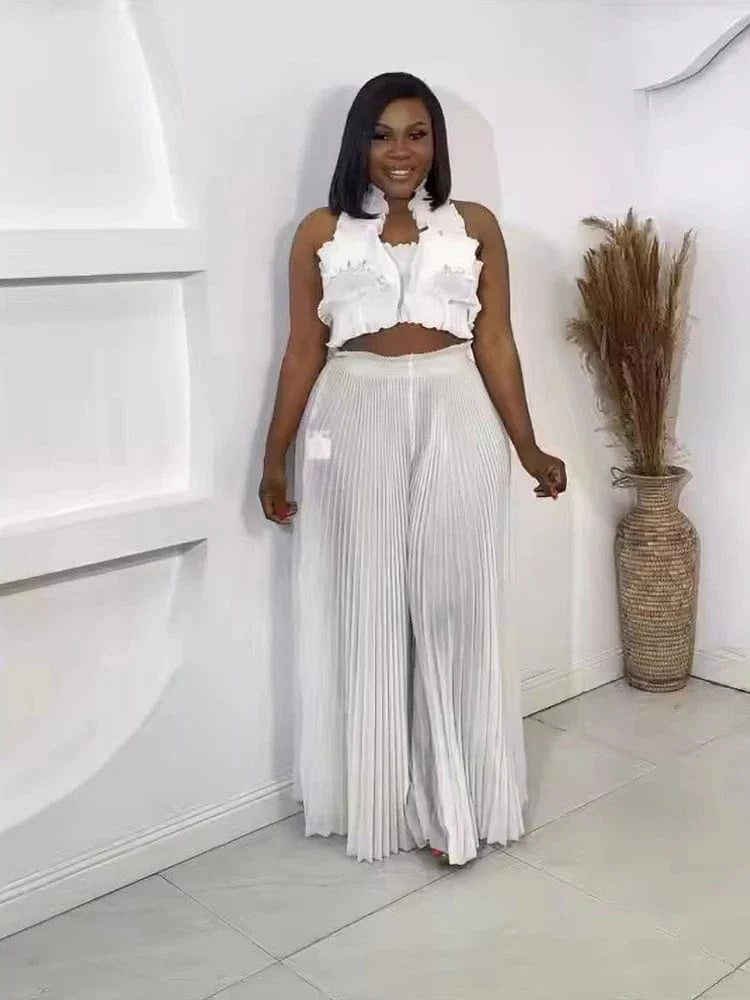 Anlan Miyake pleated 2-piece set featuring a sexy halter crop top and wide-leg pants in solid fabric, suitable for autumn fashion.