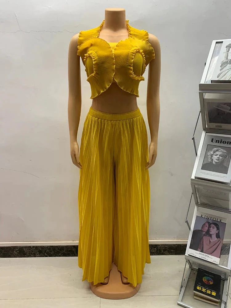 Anlan Miyake pleated 2-piece set with a sexy halter crop top and wide-leg pants, featuring ruffles and solid design.