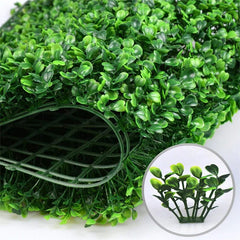 A flexible artificial boxwood hedge panel with a plastic grid backing and a close-up inset.