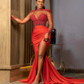 Red mermaid evening dress by SHOWLU FASHION with long sleeves, pearl beads, side split, illusion neckline, perfect for formal events.