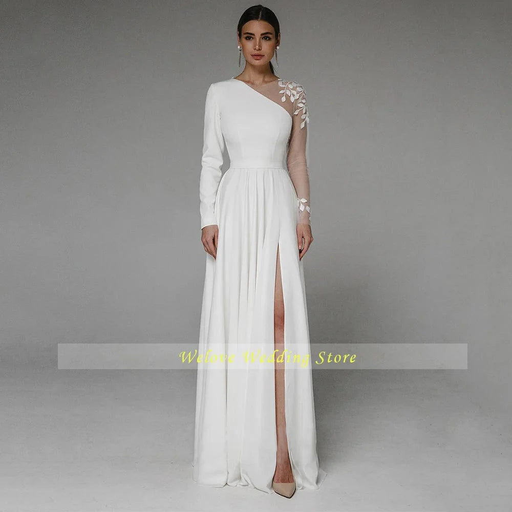 SHOWLU FASHION STORE long sleeve asymmetrical side slit wedding dress with A-line silhouette, button details, and floor-length design.