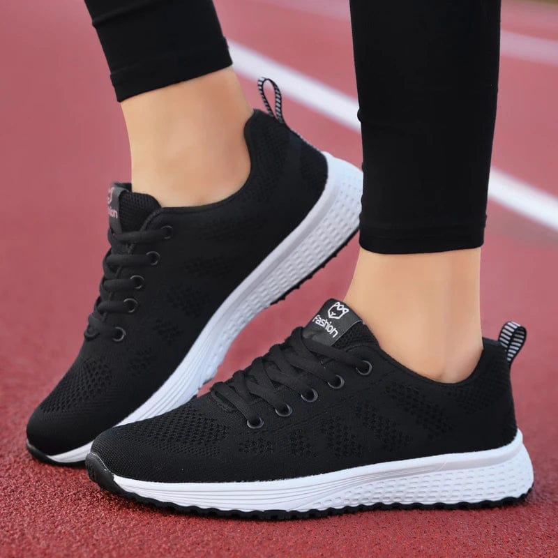 White Showlu Women's Tiger Embroidery Sports Shoes, low-top sneakers with detailed tiger embroidery on the side.