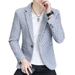 A slim-fit grey blazer for men featuring a textured pattern and a single-breasted button closure.