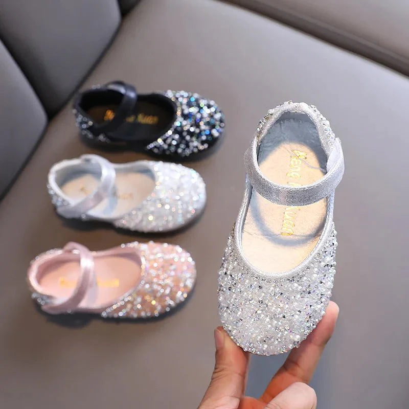 Girls rhinestone leather princess shoes with pearl bow, flat design, soft leather for toddlers, stylish spring footwear.
