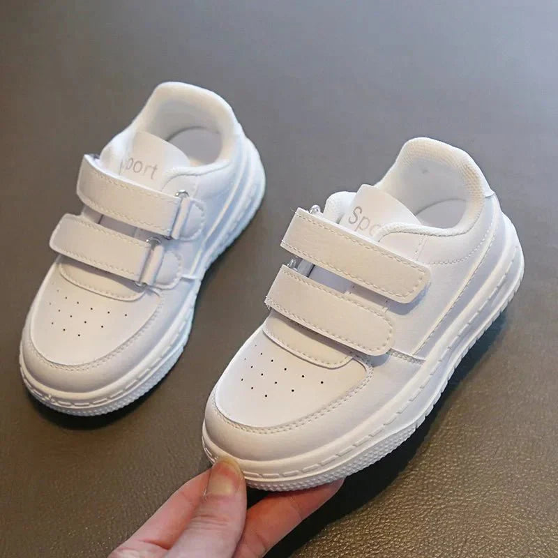 Showlu Fashion Kids white sneakers with breathable fabric, soft sole, non-slip sport shoes for boys and girls, perfect for active wear.