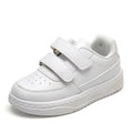 Kids white sneakers from Showlu Fashion Store, breathable sport shoes with non-slip soles for boys and girls, ideal for active wear.
