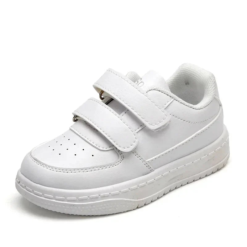 Kids white sneakers from Showlu Fashion Store, breathable sport shoes with non-slip soles for boys and girls, ideal for active wear.