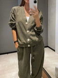 Women's two-piece knit sports suit with cardigan and lace-up pants, featuring a casual, single-breasted design for autumn-winter wear.