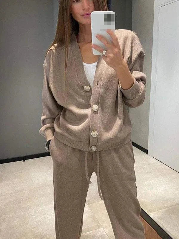 Women's two-piece knit sports suit with cardigan and lace-up pants, perfect for autumn and winter casual wear.