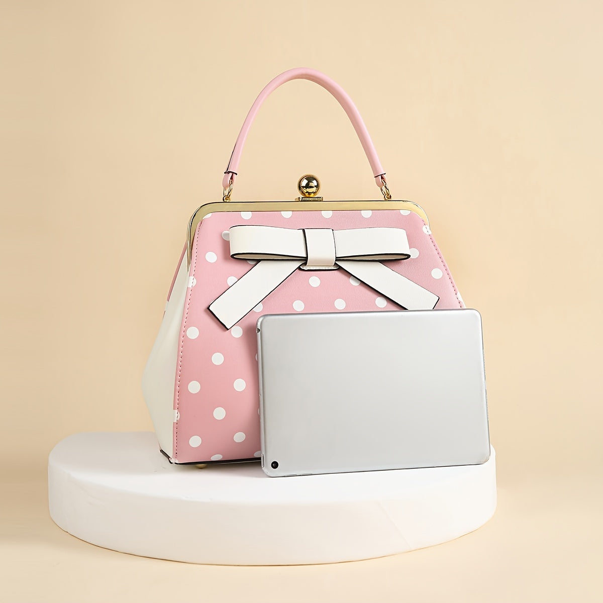 SHOWLU polka dot patent leather handbag with bow, kiss lock closure, stylish accessory with a classic design and elegant details.