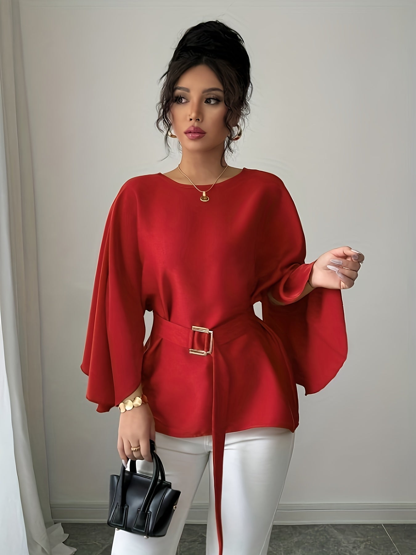 Light blue long sleeve belted blouse by SHOWLU FASHION with elegant crew neck and stylish fit, perfect for sophisticated casual wear.