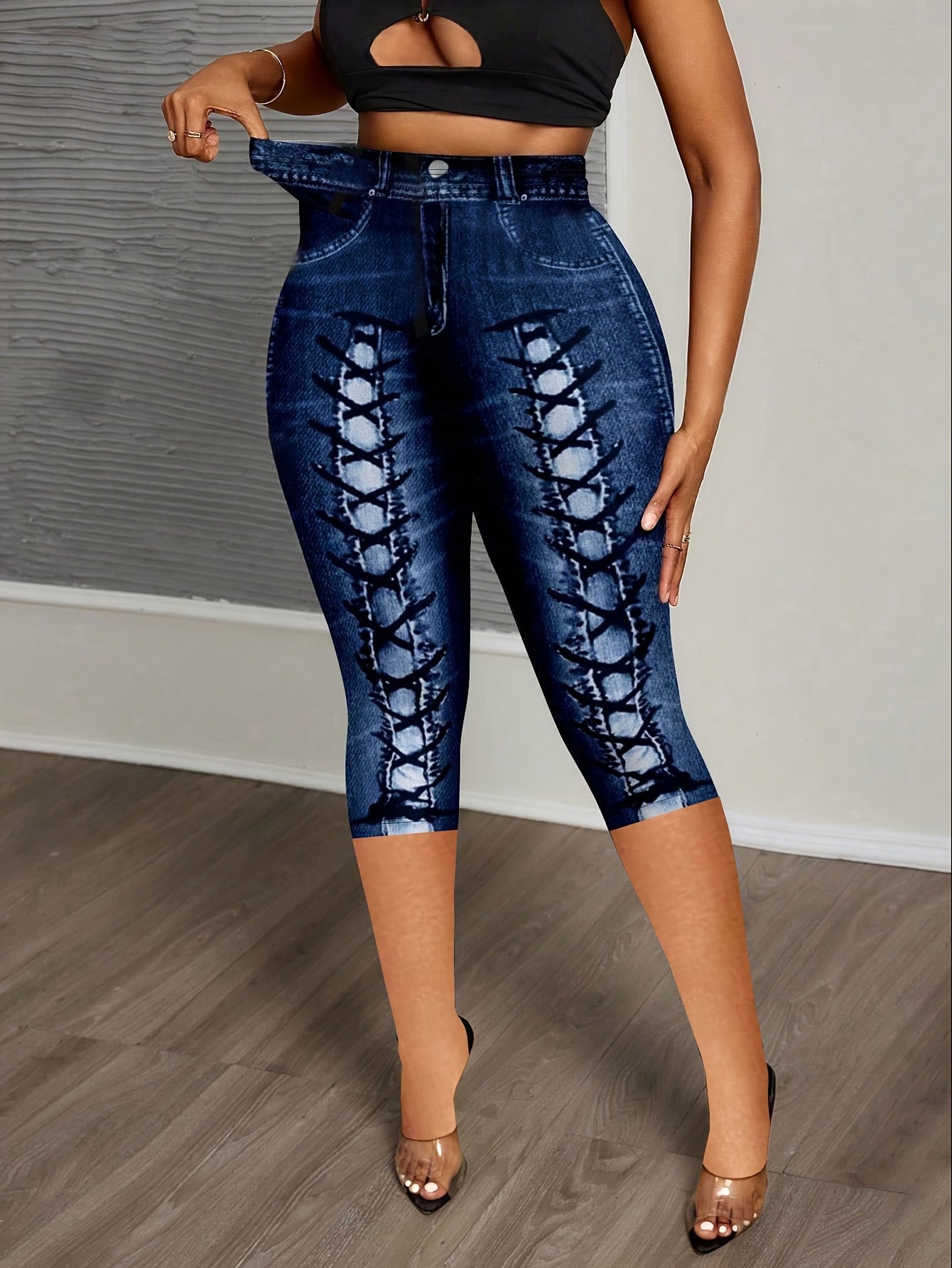 Showlu Fashion women's imitation denim print leggings, stretchy skinny pants with a denim look, close-up view of fabric and fit.