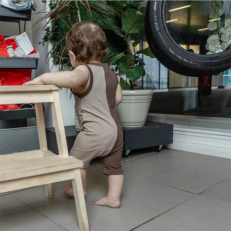 Baby boy sleeveless colorblock denim romper with front buttons and round neck, perfect for summer wear.