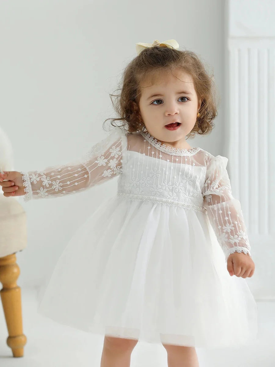 White mesh baby girls christening dress with A-line design, perfect for parties, birthdays, and weddings.