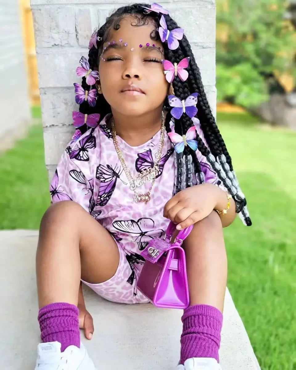 Showlu Fashion Girl's 2-piece summer clothing set with short sleeve rainbow top and colorful shorts for kids or toddlers.