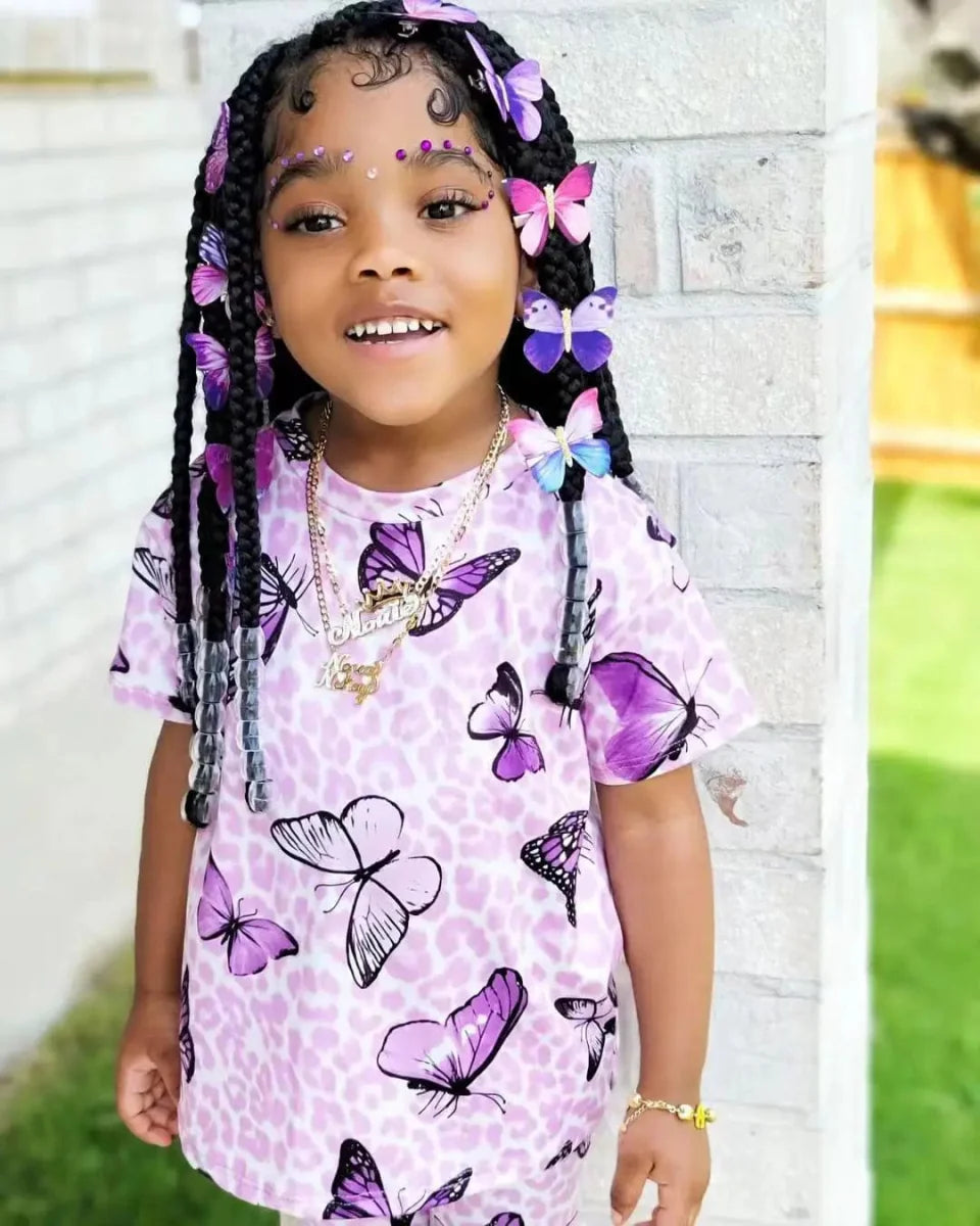 Girls' summer clothing set by Showlu Fashion with short sleeve rainbow top and matching colorful shorts for kids.