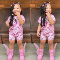 Cute girls' summer clothing set with short sleeve rainbow top and matching colorful shorts, suitable for children around 8 years old.
