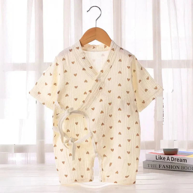 Soft summer baby romper by ZoErLi, short sleeve muslin cotton jumpsuit for newborns and infants, suitable for boys and girls.