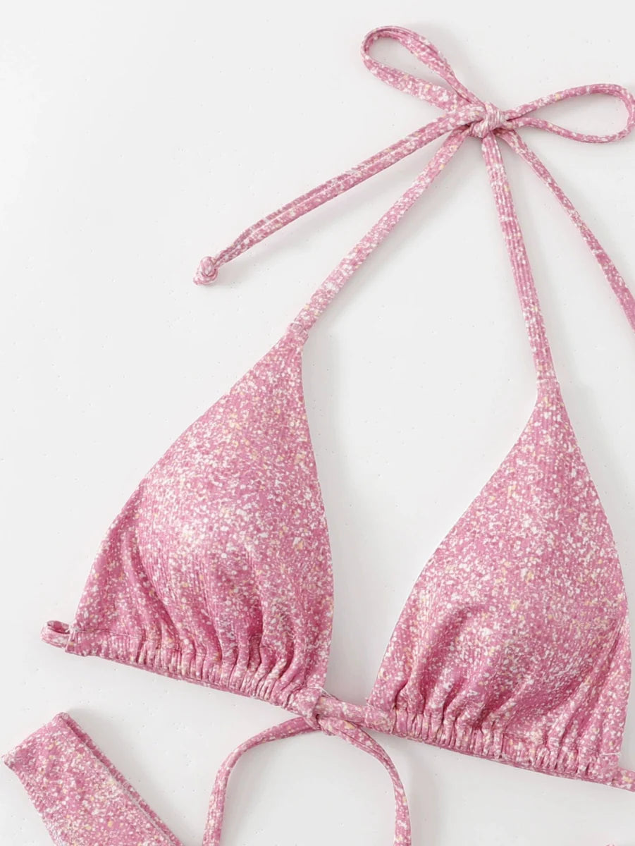 Backless triangle bikini with shoelace ties in solid color, featuring a stylish, minimal design perfect for summer swimwear.