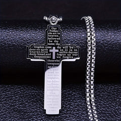 A stainless steel cross pendant necklace engraved with the Lord's Prayer on a silver chain.