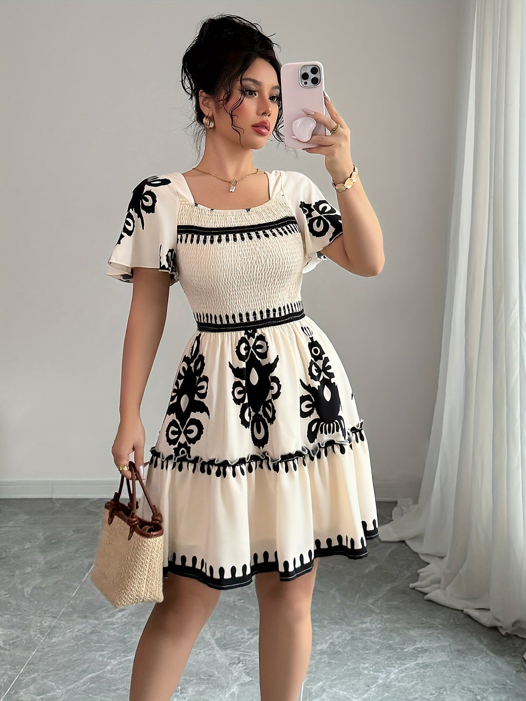 Printed SHOWLU FASHION Square Neck Mini Dress with A-line pleated design, perfect for stylish casual or semi-formal wear.