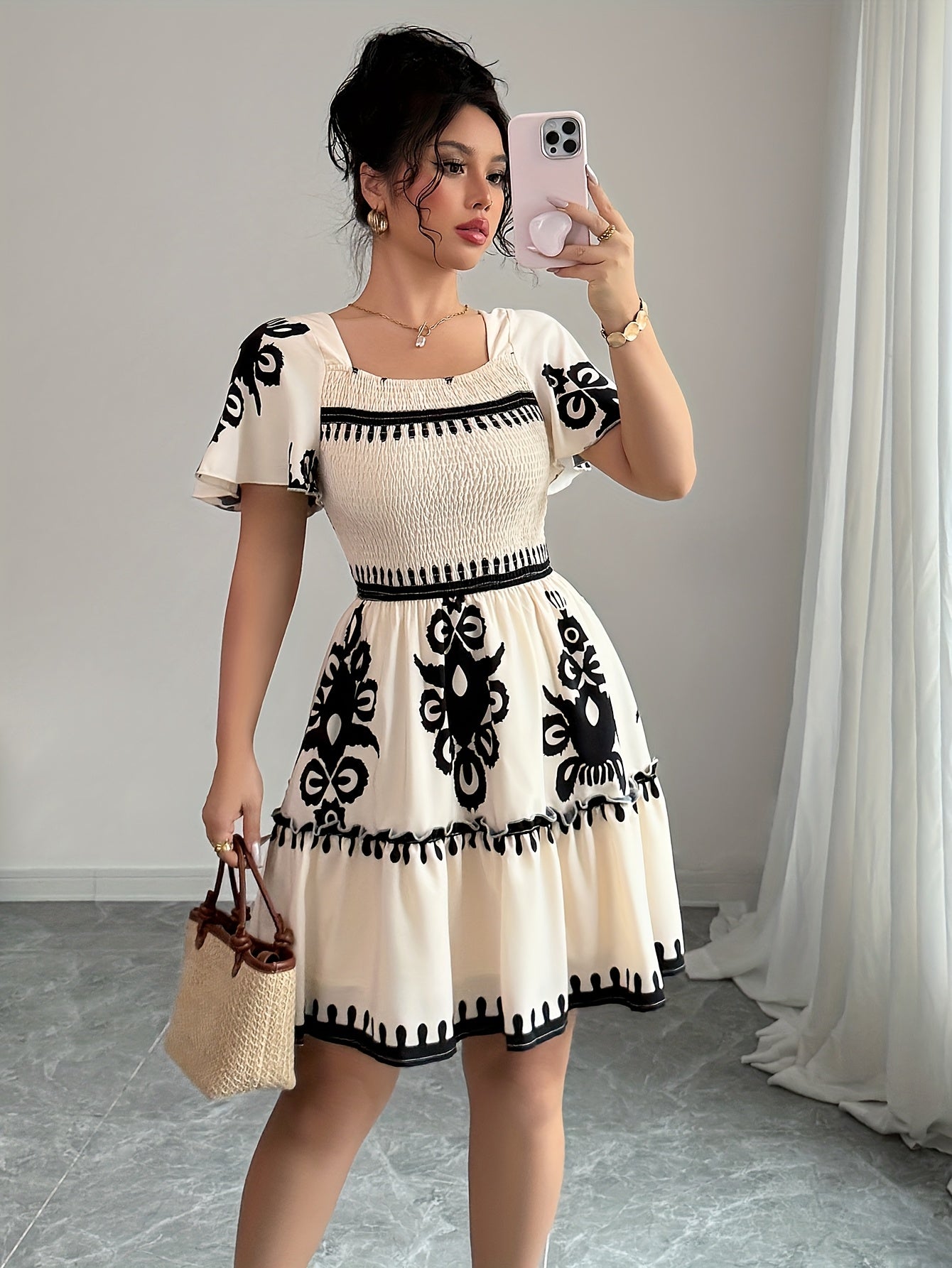 Printed SHOWLU FASHION Square Neck Mini Dress with A-line pleated design, perfect for stylish casual or semi-formal wear.