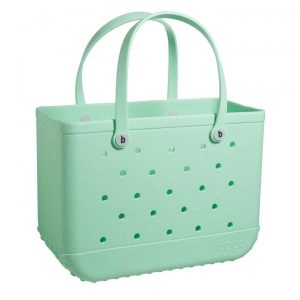 Large waterproof EVA jelly beach bag by Showlu Fashion, featuring a transparent design with hole details for outdoor and shopping use.