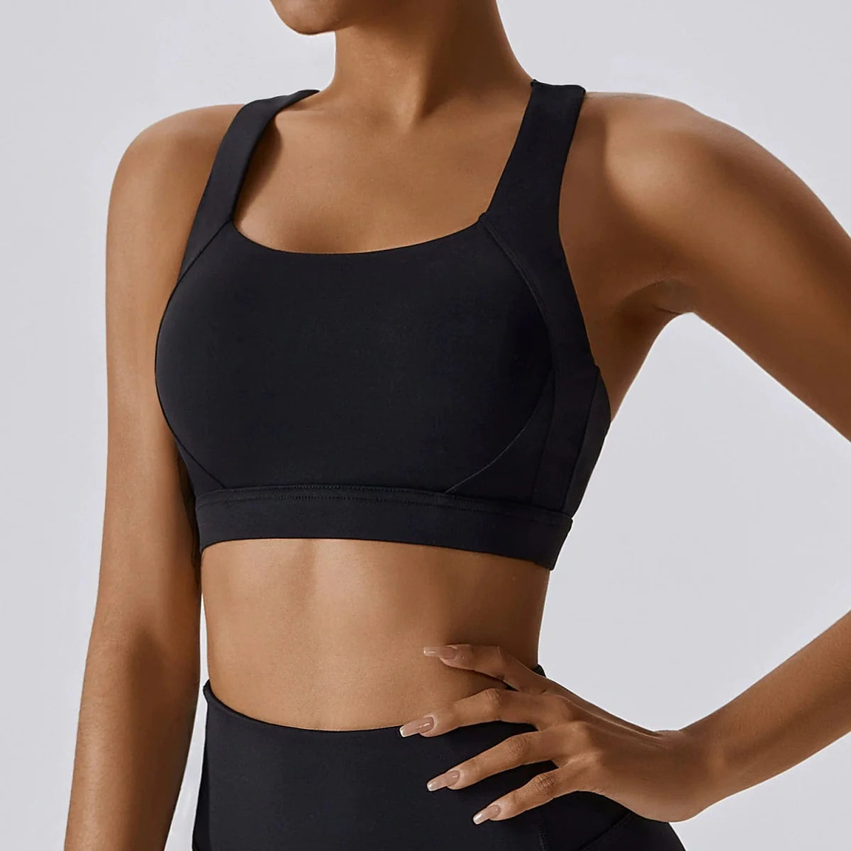 Showlu Women's Cross Back Yoga Vest with padded sports bra, designed for workout and running, featuring a stylish back design and comfortable fit.