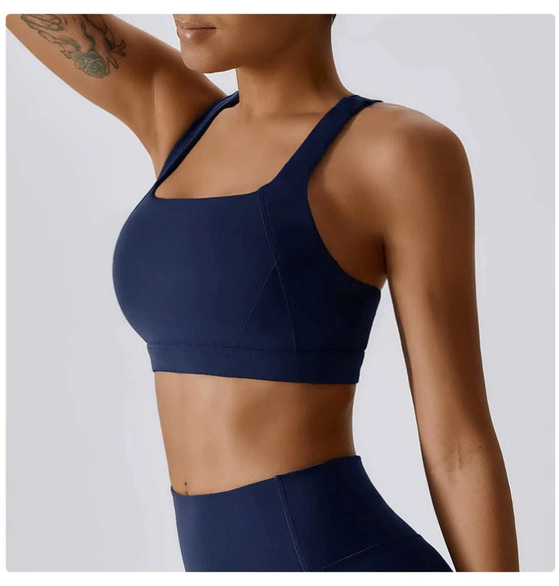 Showlu Women's cross-back padded yoga vest with built-in sports bra, designed for comfortable workout and exercise activities.