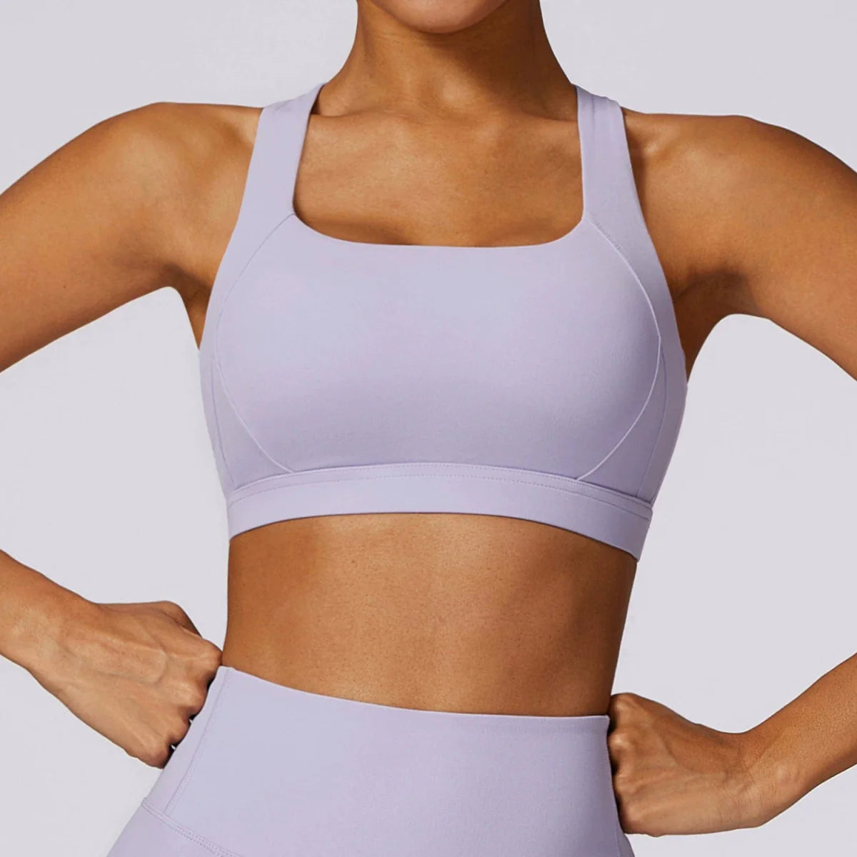 Showlu Women's Cross Back Padded Yoga Vest with built-in sports bra, designed for comfortable workout and running activities.