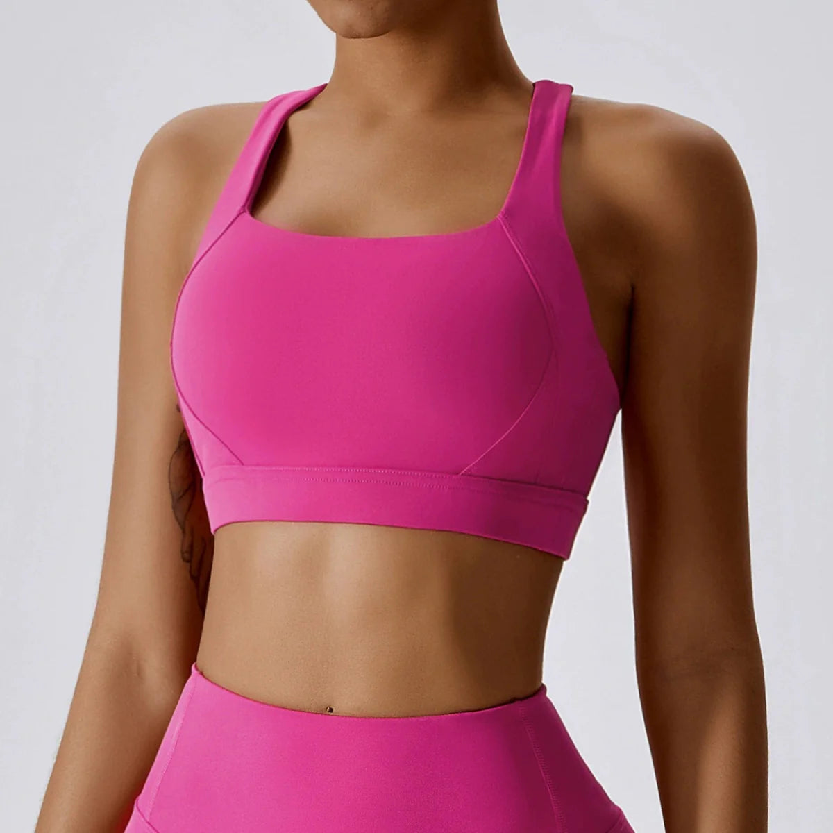 Showlu Women's Cross Back Padded Yoga Vest and Sports Bra, moisture-wicking workout top with supportive chest pad for women.